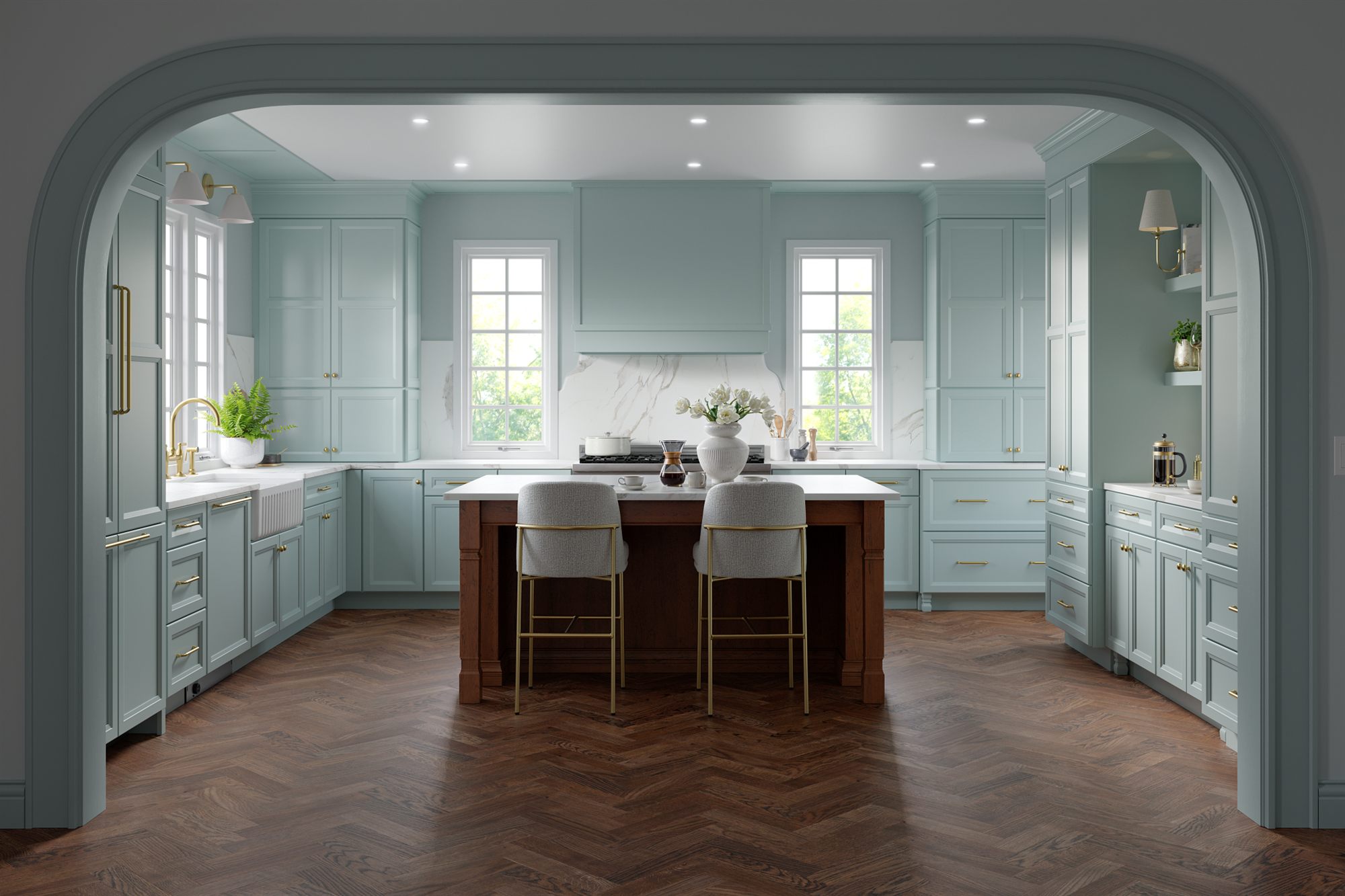 Coastal teal kitchen cabinetry with herringbone flooring