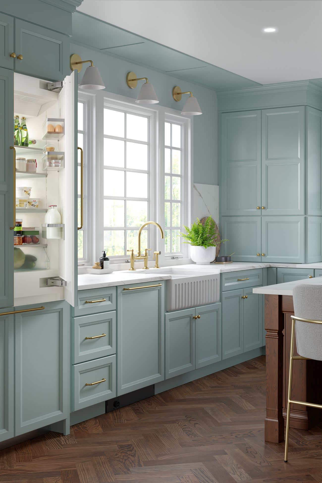 Detailed kitchen cabinetry with brass hardware